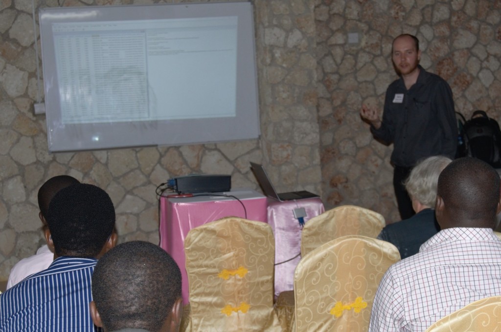 Danny Parsons making a presentation in Tanzania about R-Insat's use in analysing procurement data in a bid to identify corruptions risks. 